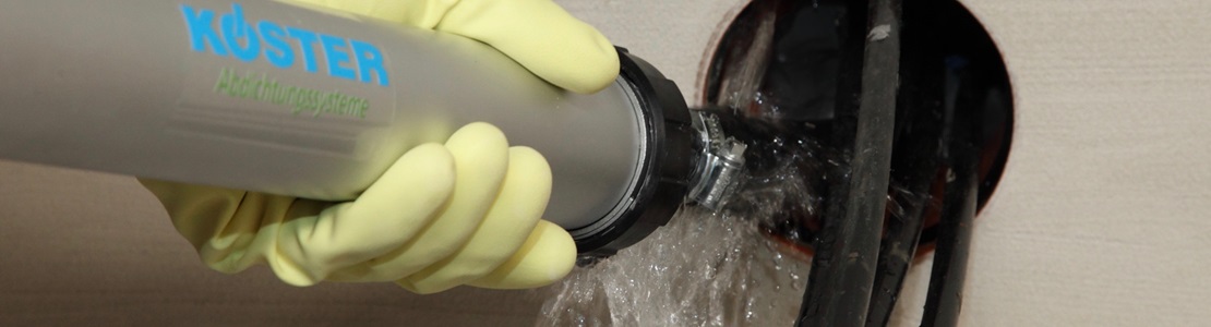 Pâte d’Étanchéité câbles et conduits 1.jpg Abdichtung Rohrdurchführungen